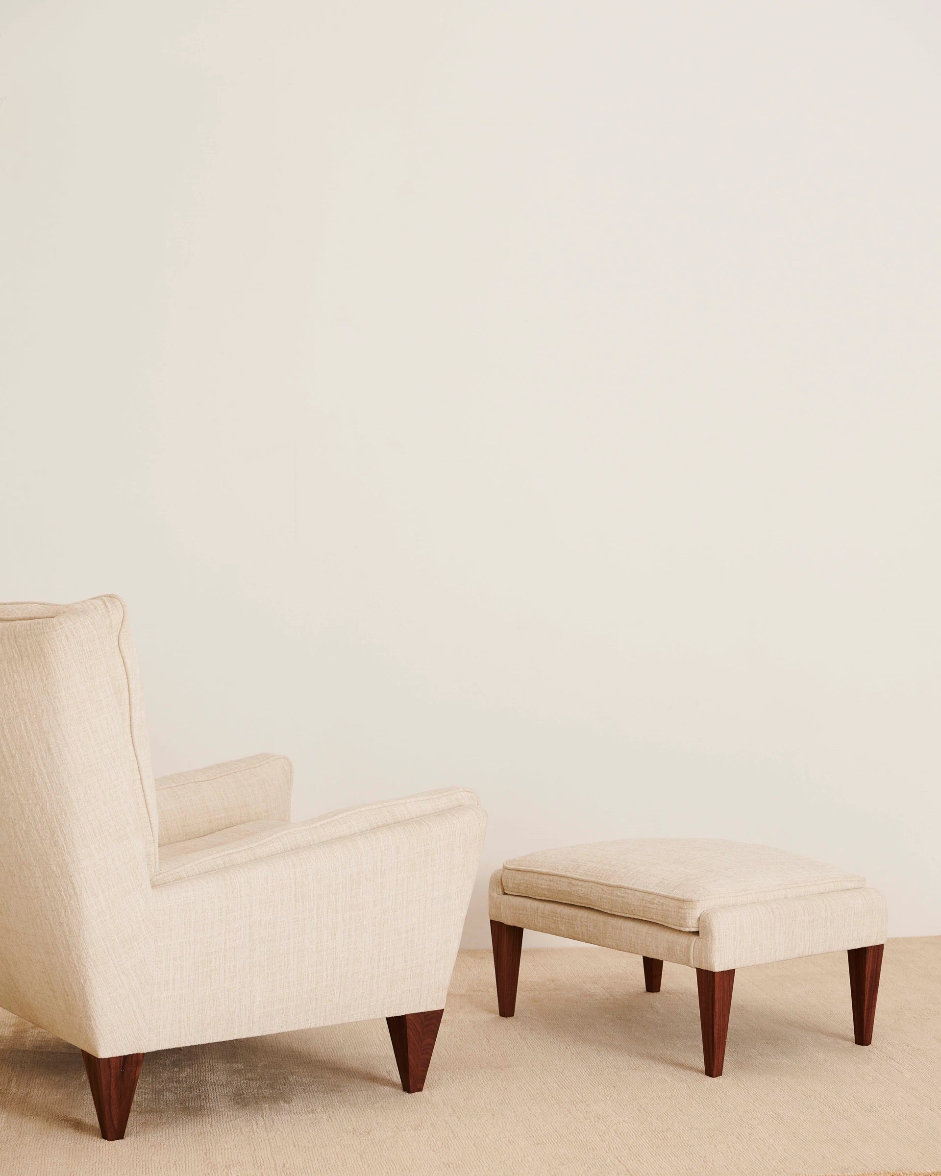V11 Ottoman by GUBI shown in an interior setting