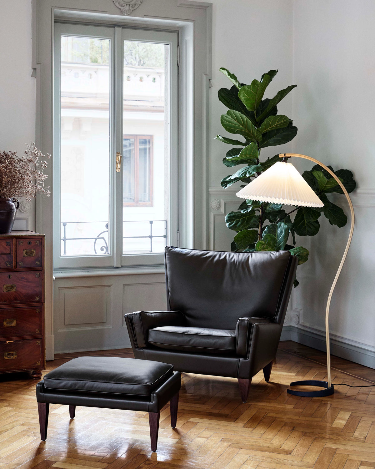 V11 Ottoman by GUBI shown in an interior setting, view 2