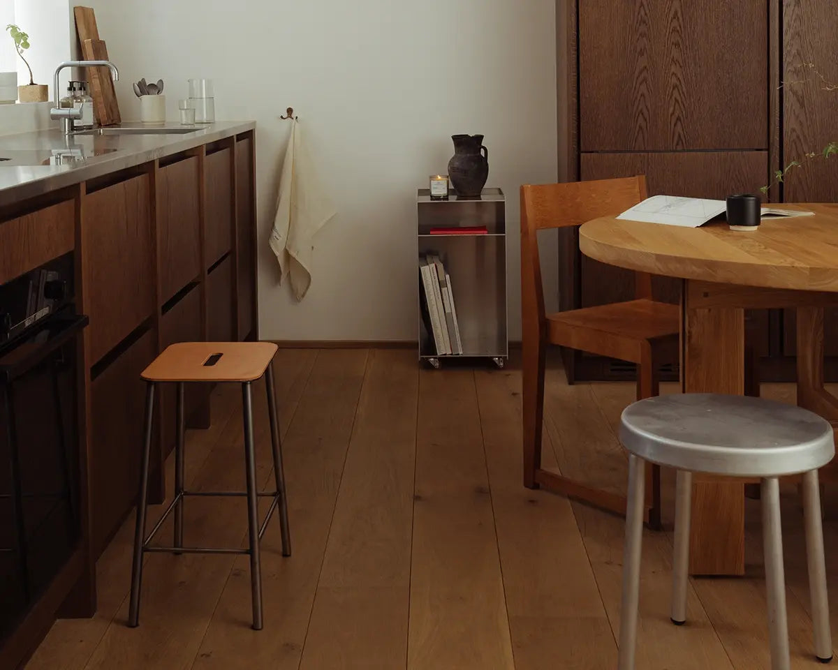 A quiet FRAMA kitchen with Adam Stool, Rivet Box Table and Farmhouse Table