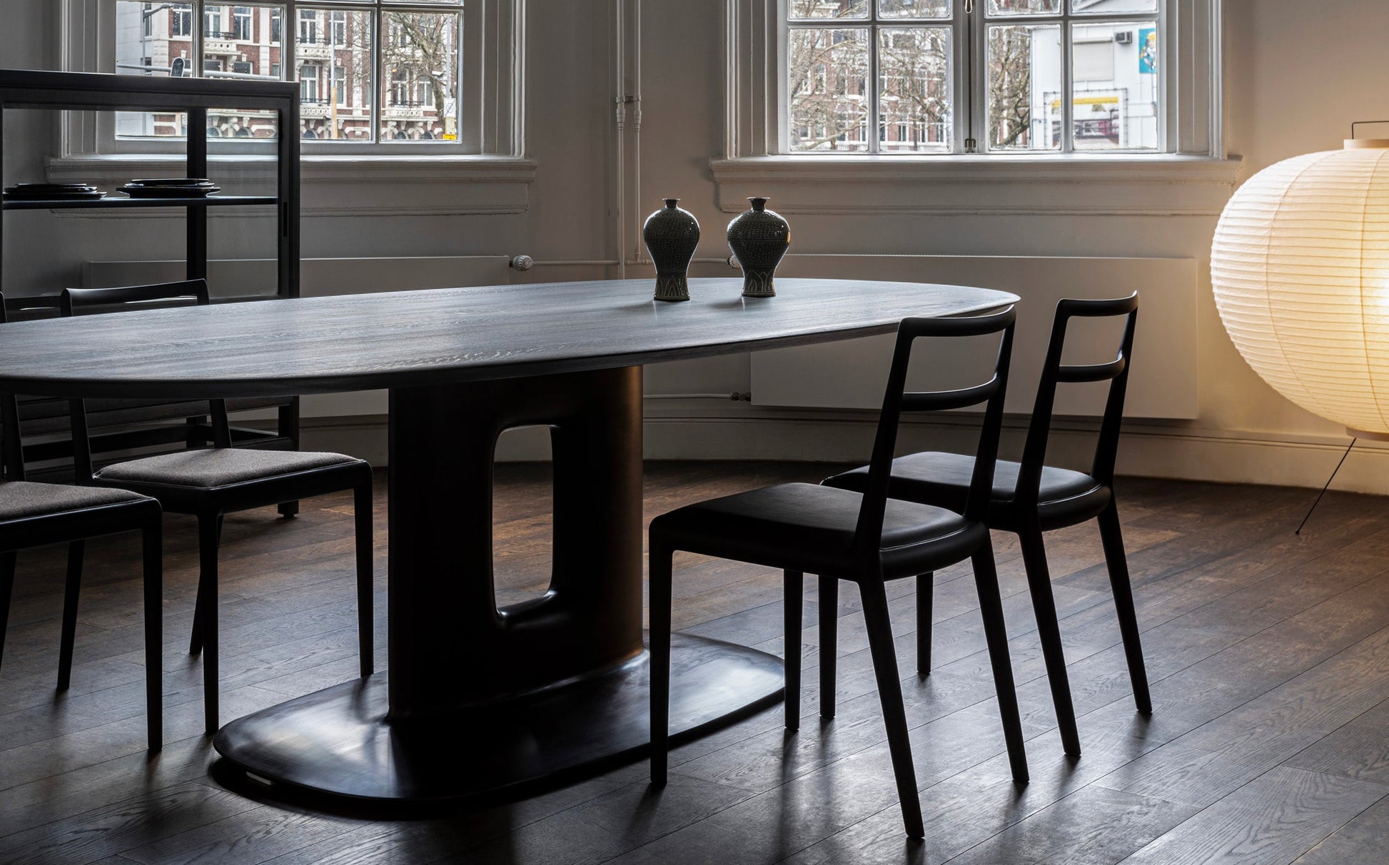 Sculpture Casting Bronze Table in a dark timber dining room